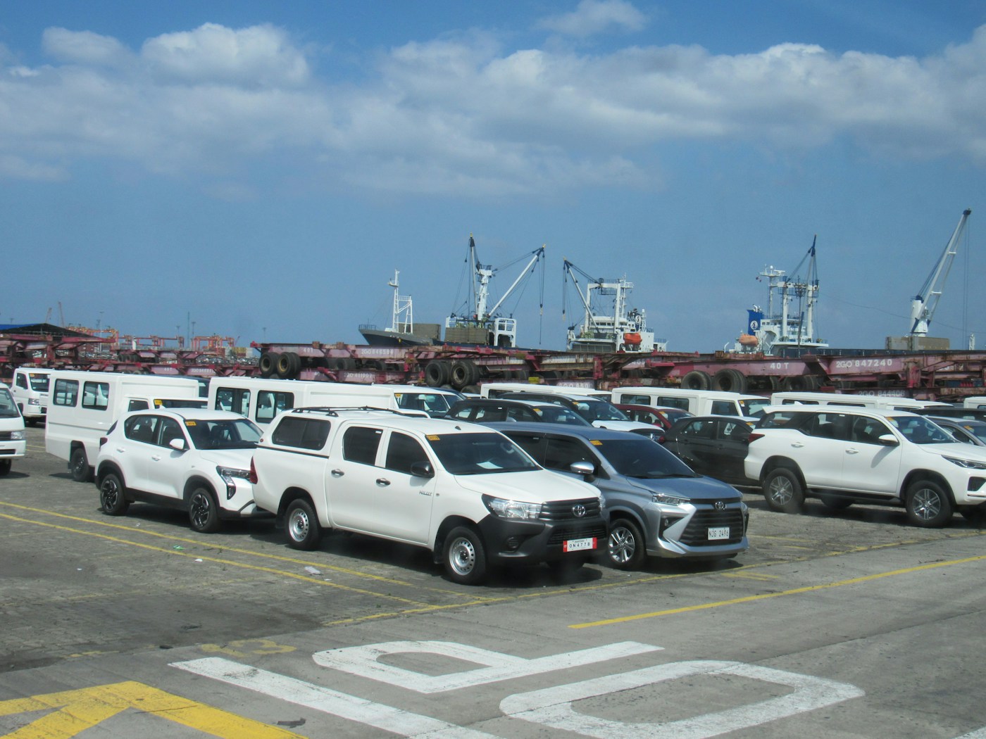 Vehicles at a shipping port ready for international export